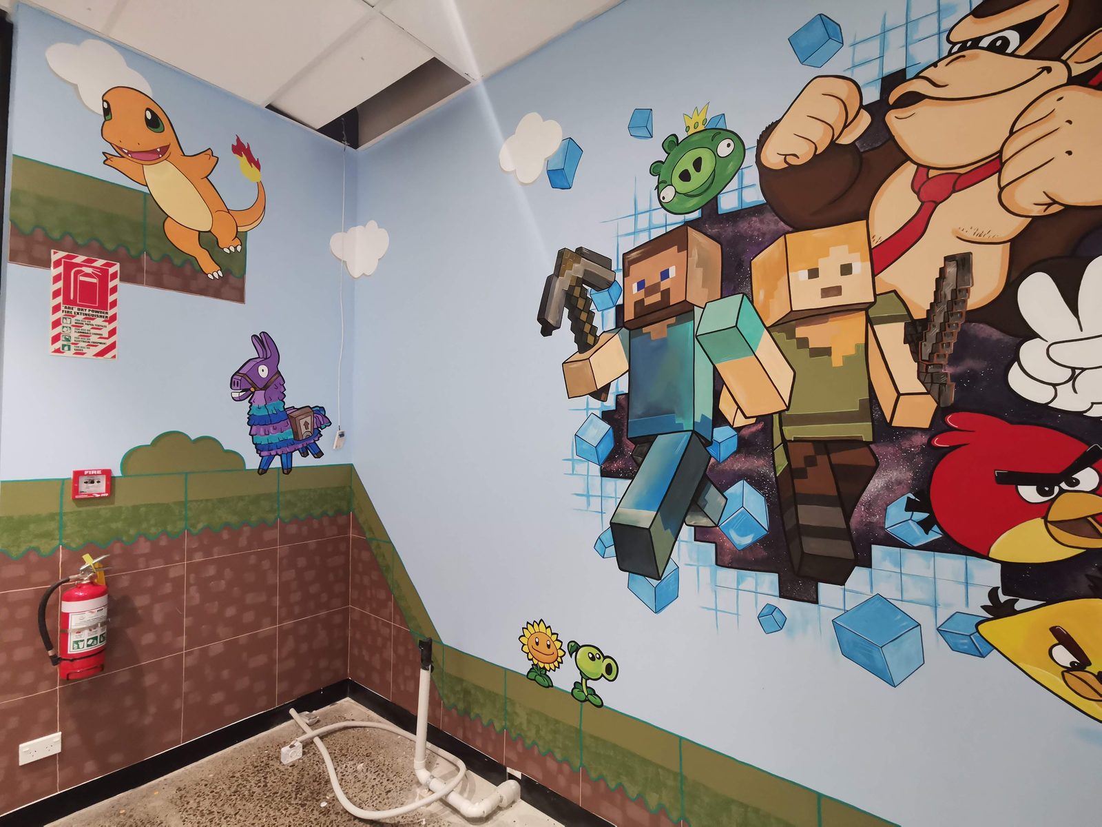 Pixel Party mural — finished view of Donkey Kong, Sonic and the gaming character line-up