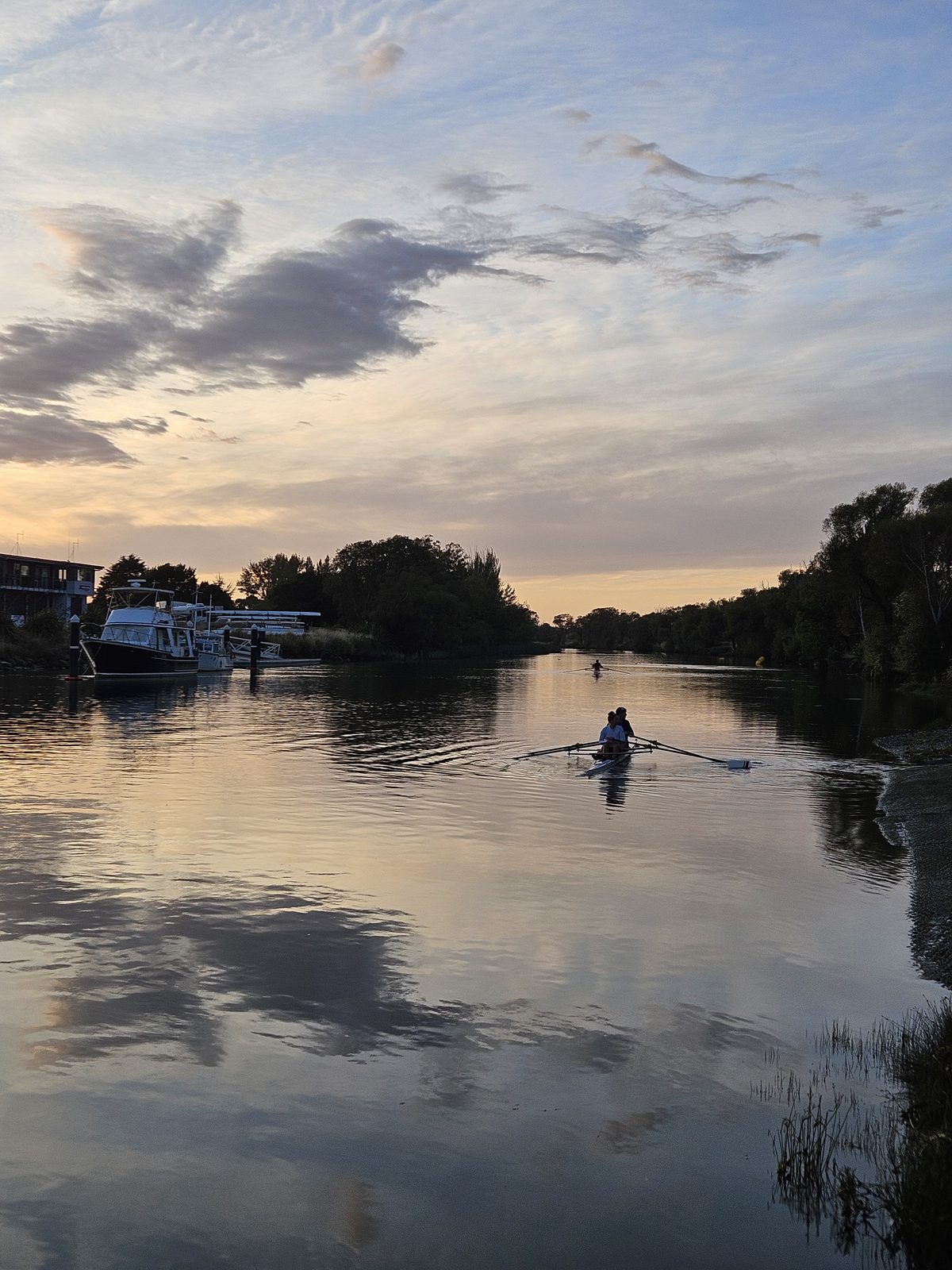 Pulling Together — calm river at dusk by the Cure Boat Club site