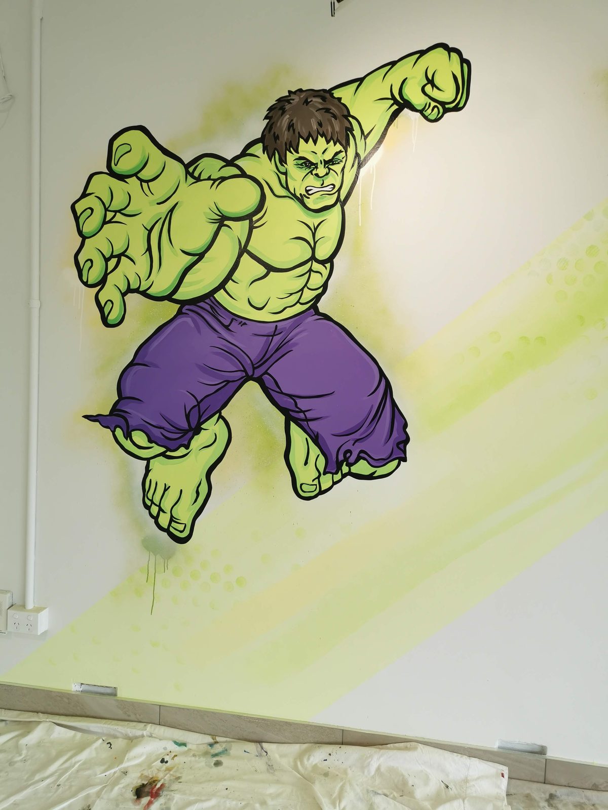 Shear Havoc mural detail — the Hulk character painted on the salon wall