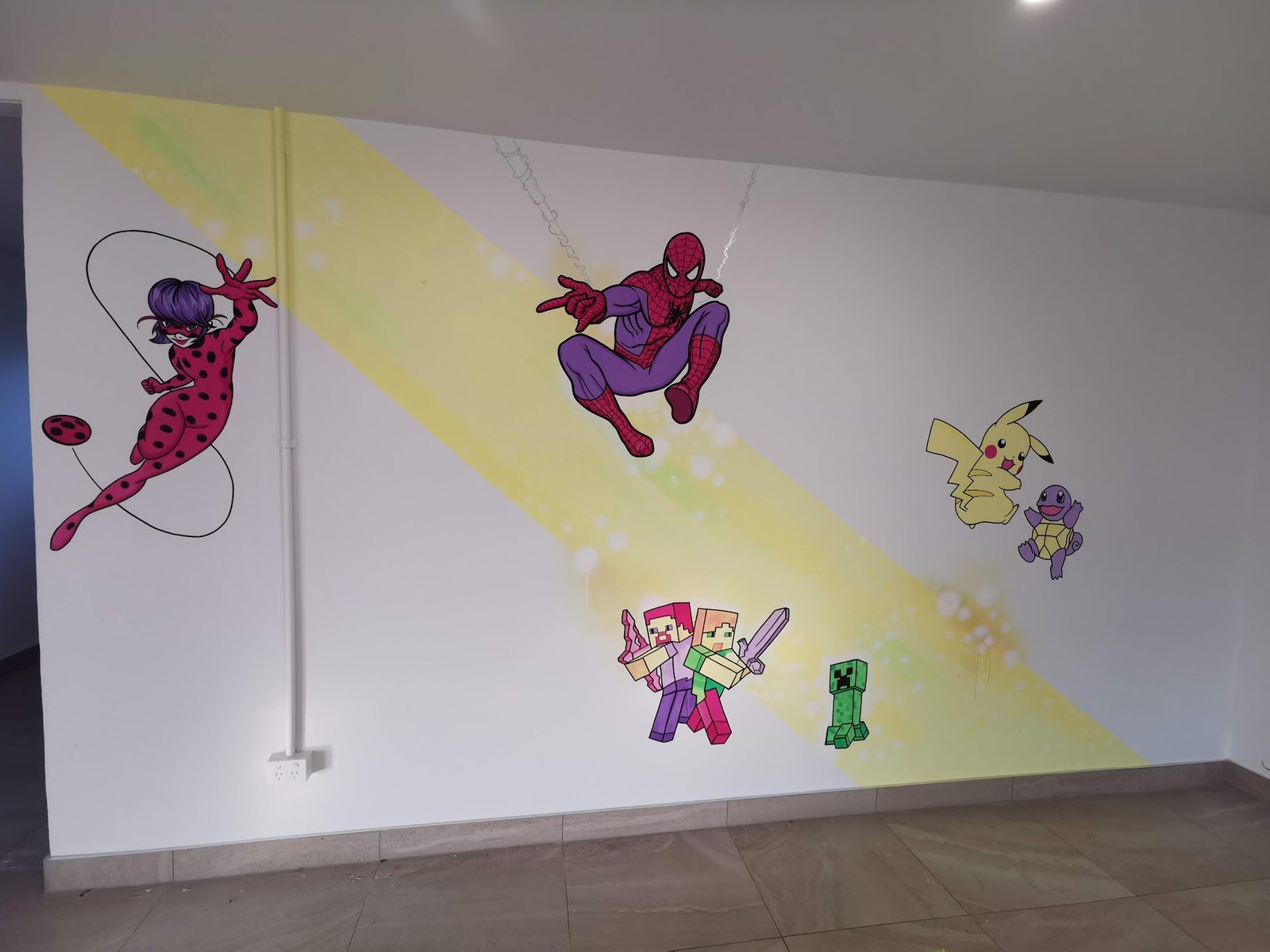 Shear Havoc mural detail — Miraculous Ladybug, Spider-Man, Pikachu and Mario characters on the salon wall