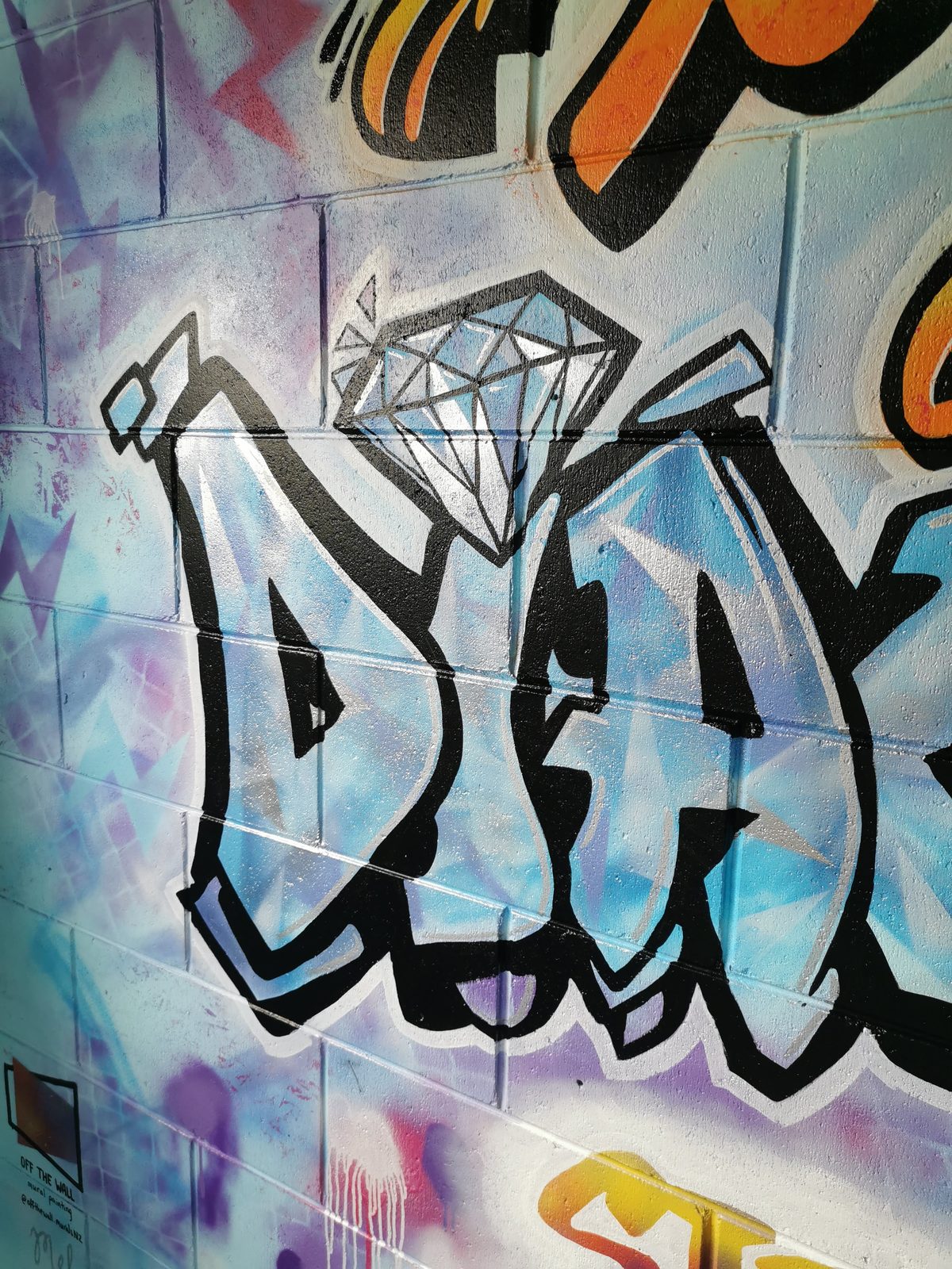 You Rock mural detail — close-up of the 'Diamonds' lettering and crown