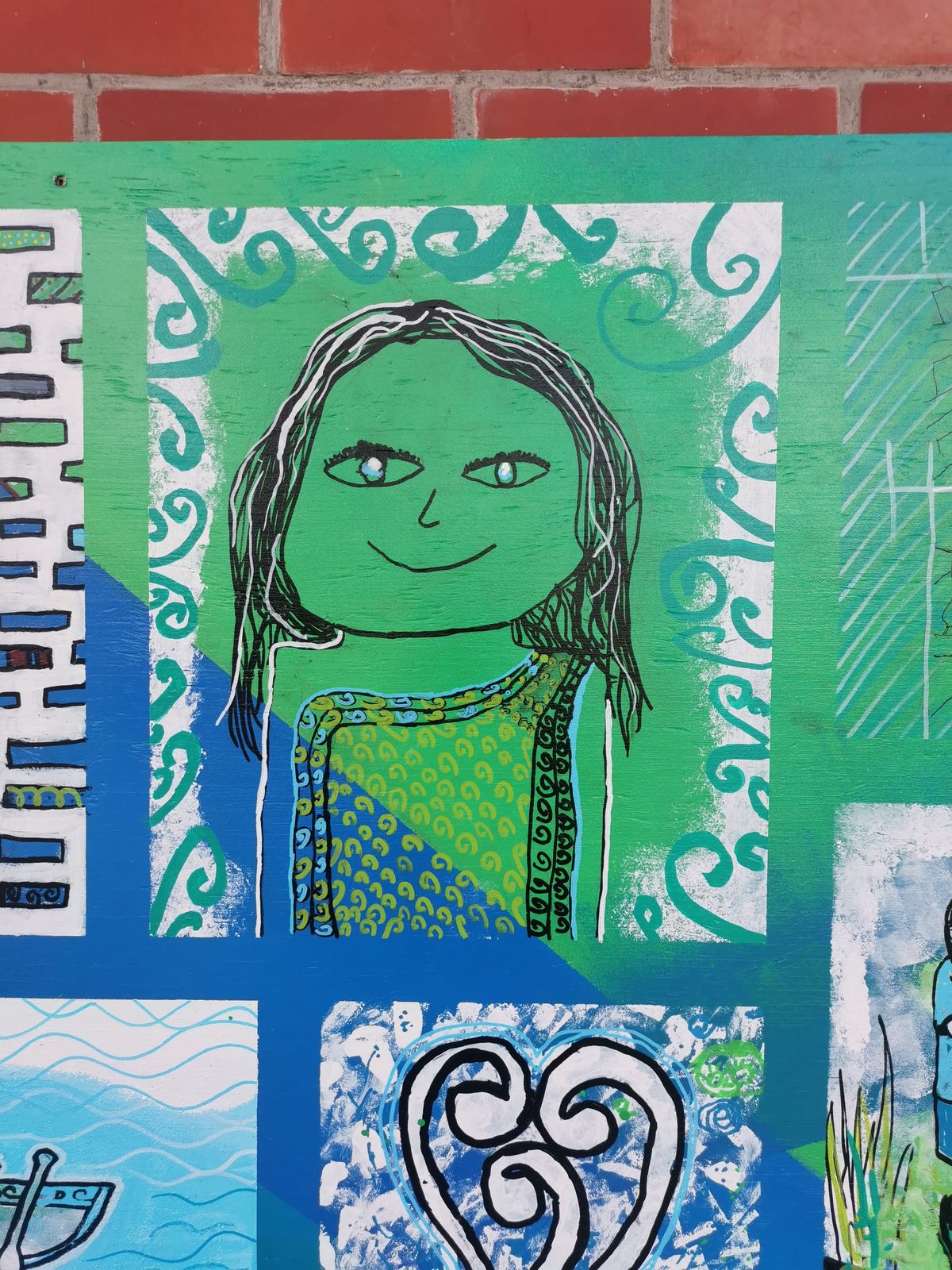 Our Stars mural detail — a student-painted panel featuring a girl's portrait