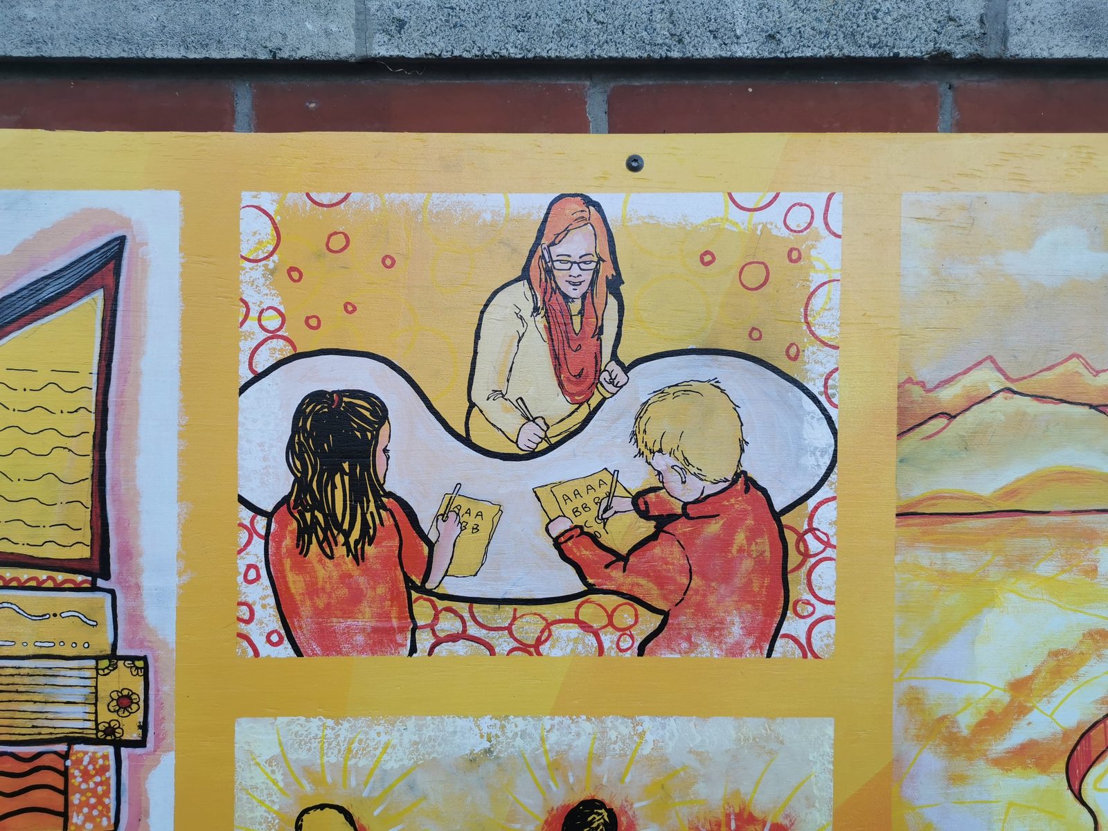 Our Stars mural detail — a student-painted panel of two figures painting together