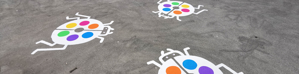 Playtime Bugs playground groundwork — colourful copycat ladybird games painted on the schoolyard asphalt, Cust Primary School
