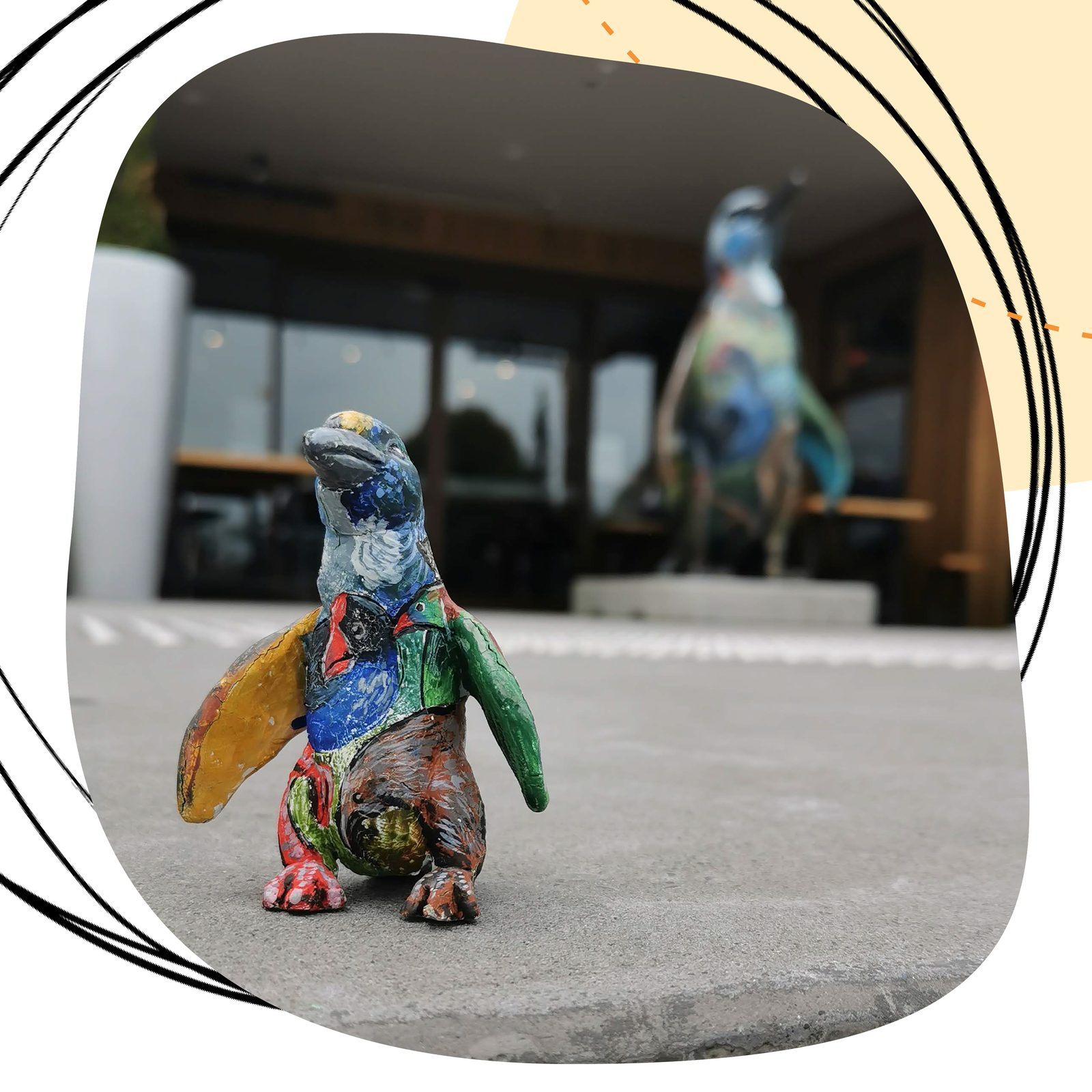 Birds of a Feather — finished penguin sculpture shared on social media in a circular frame graphic
