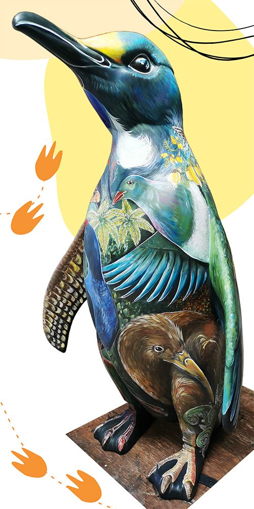 Birds of a Feather — finished penguin sculpture isolated on a plain background for promotional use