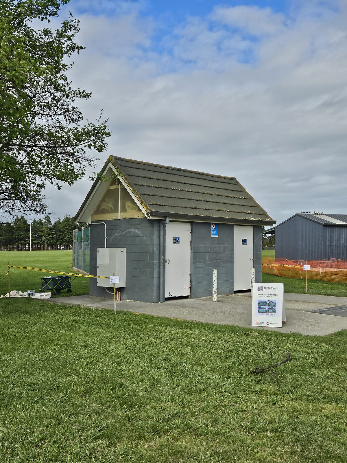 Flowing With Whio — Dudley Park toilet block before the mural, plain grey exterior