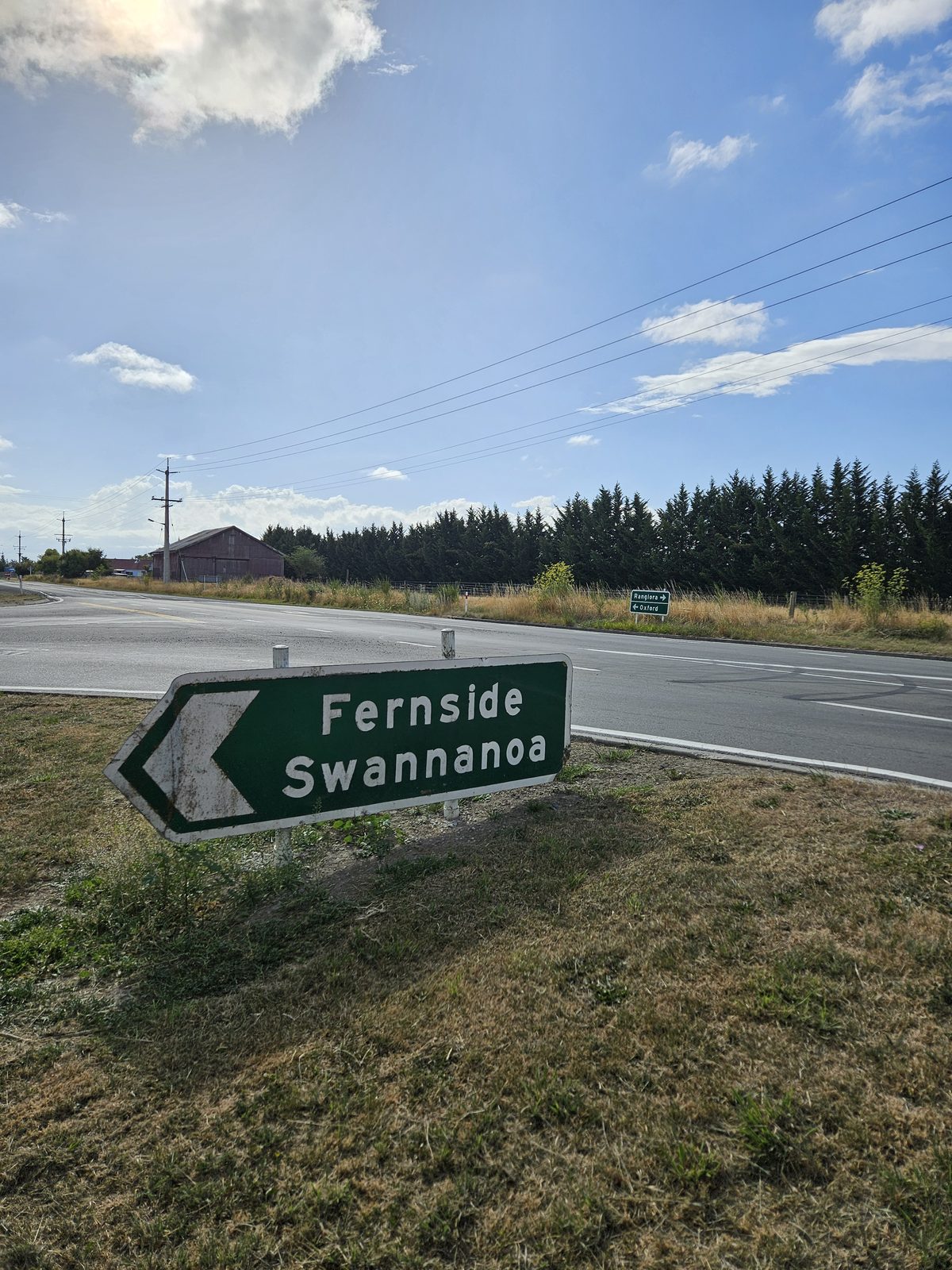 Fernside and Swannanoa road sign near the Hidden Treasure mural site