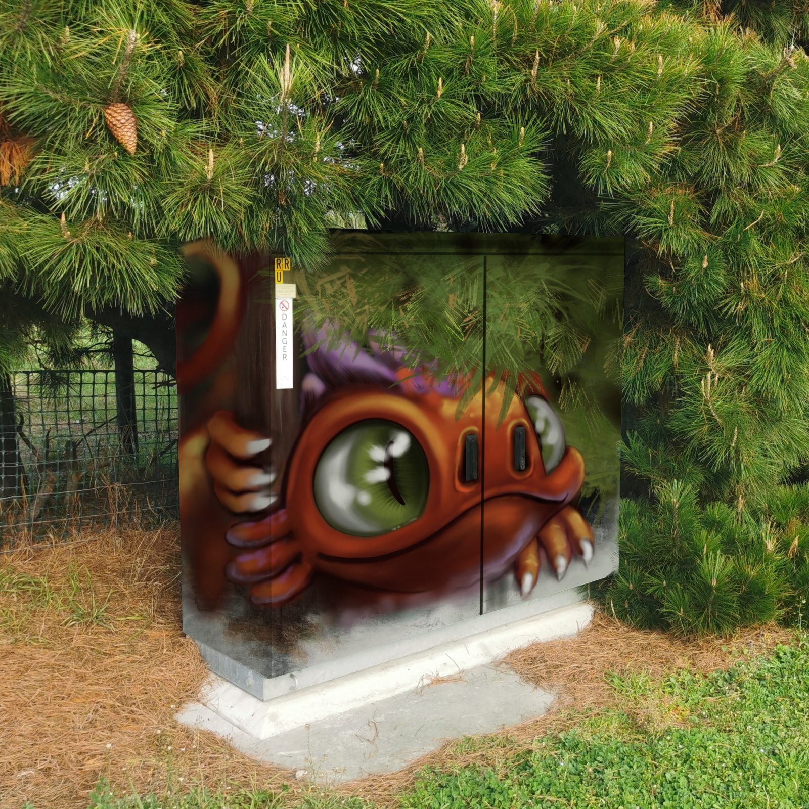 Hidden Treasure mural — the dragon design peeking out from the hedge