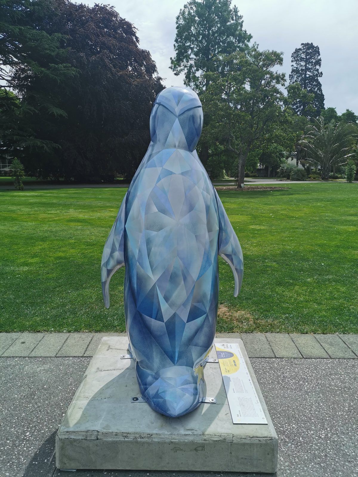 Ice sculpture — finished penguin sculpture on display in a park