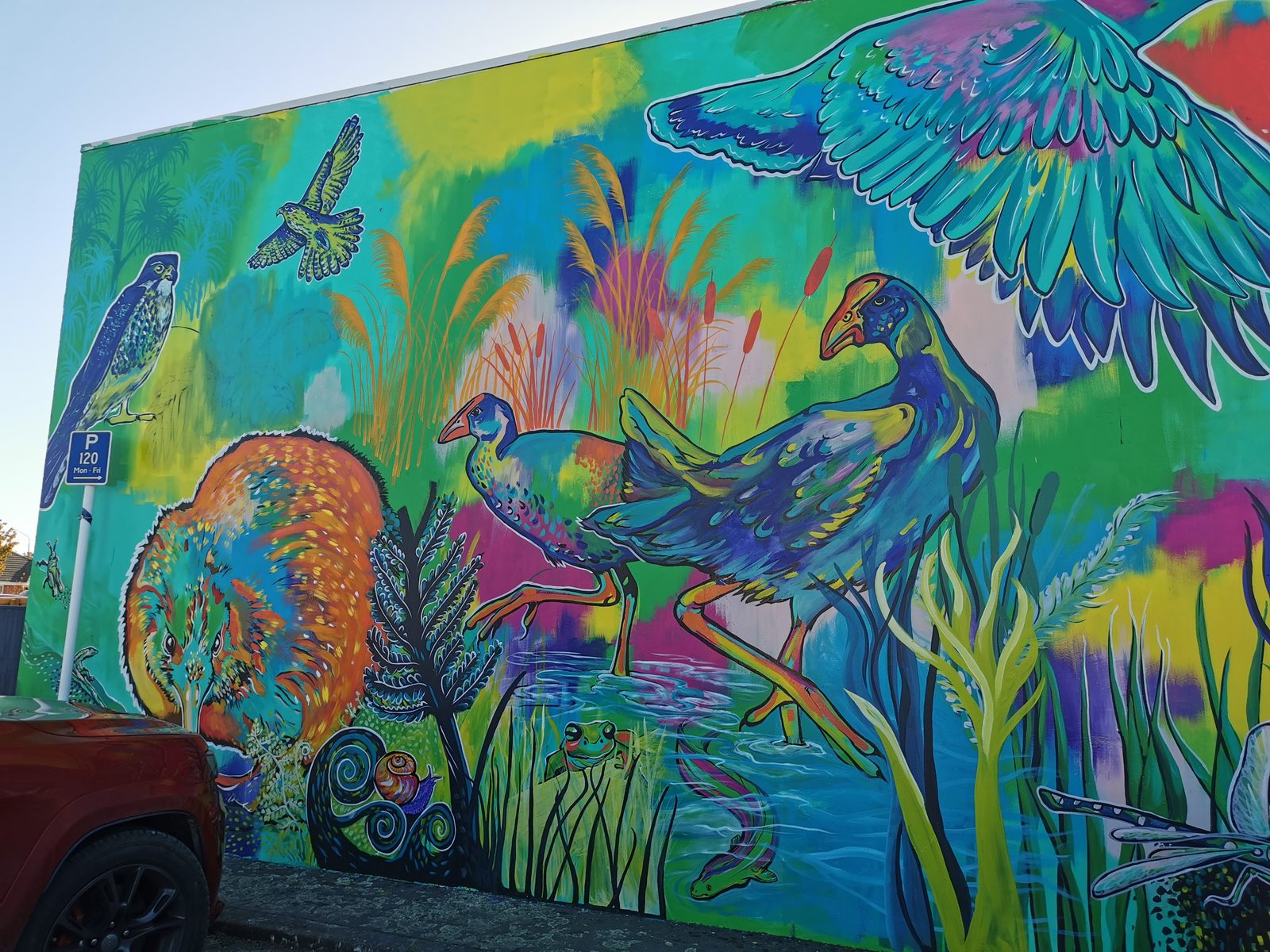 In Our Hands mural — wide view of the finished design with fish and seahorse shapes