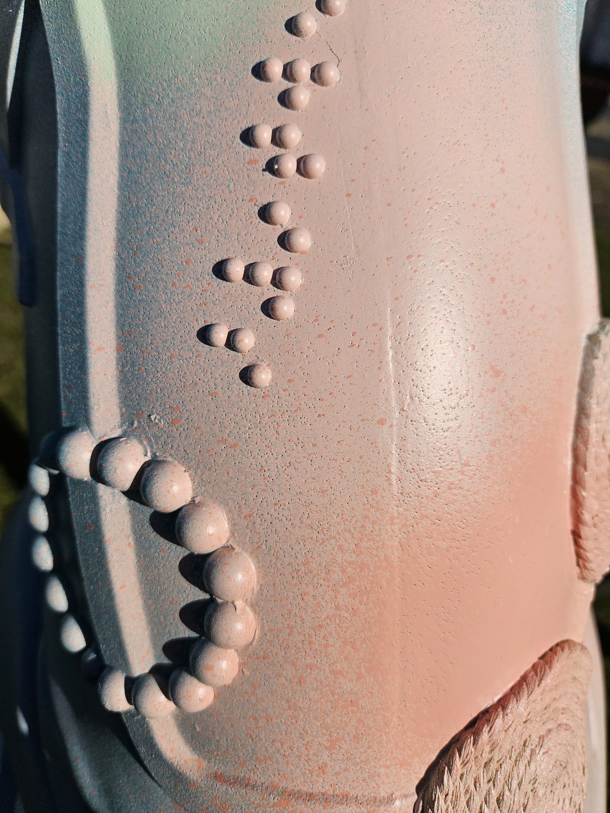 Louis Braille sculpture detail — close-up of the raised braille dots on the sculpture's body