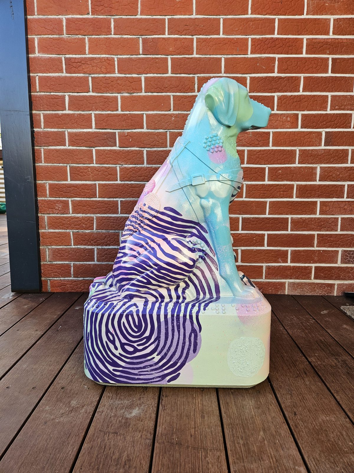 Louis Braille sculpture — side view of the finished sculpture near a doorway