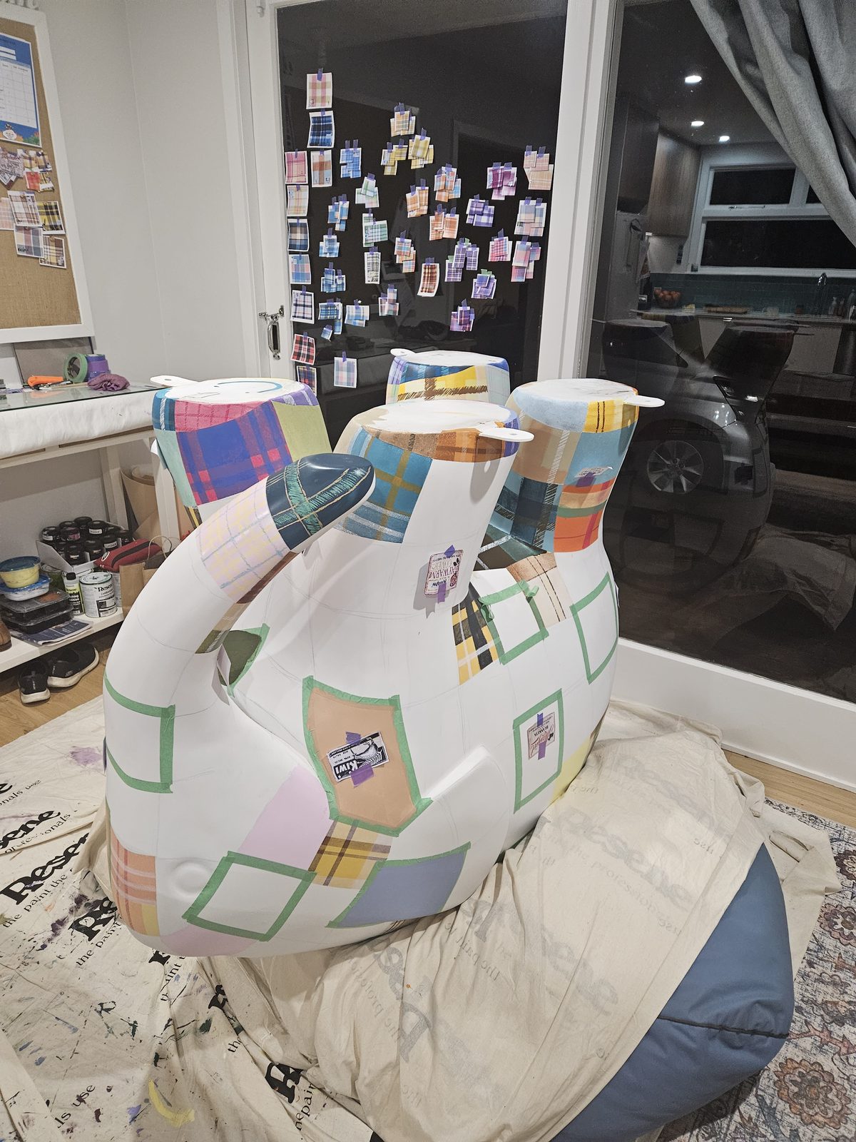 Mammoth Wolley sculpture — blank white elephant sculpture in the workshop before painting