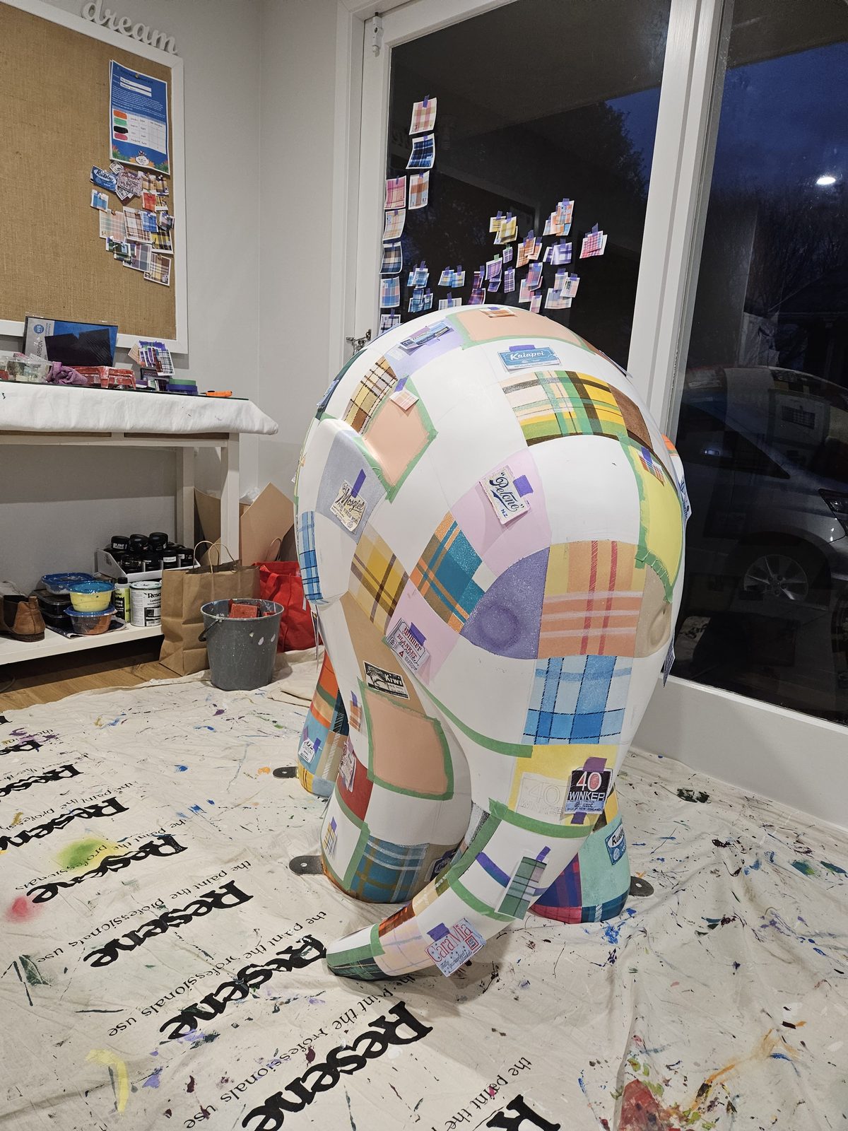 Mammoth Wolley sculpture — blank elephant sculpture viewed from a different angle in the workshop