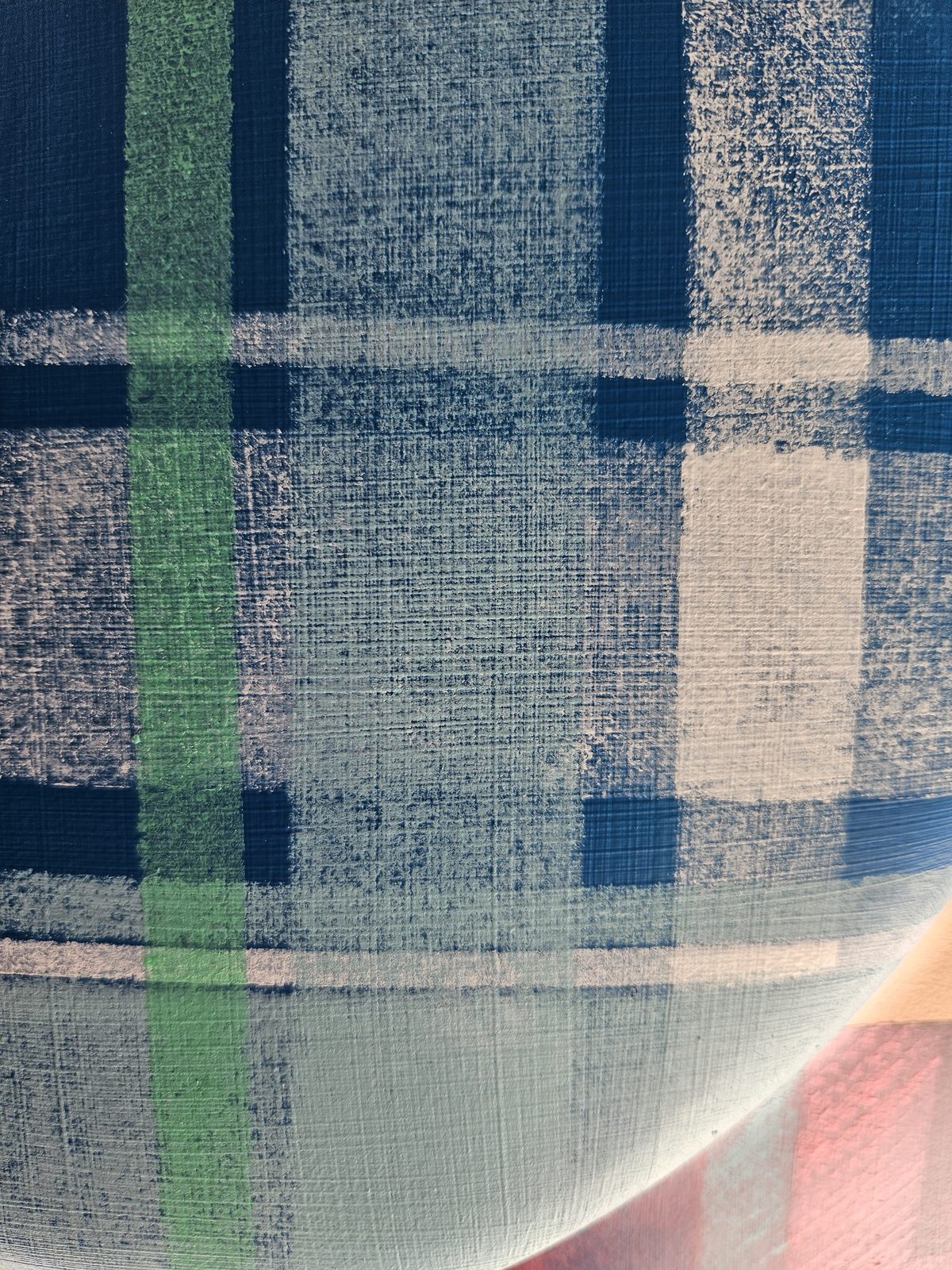 Mammoth Wolley research — close-up of a blue and green plaid wool blanket sample