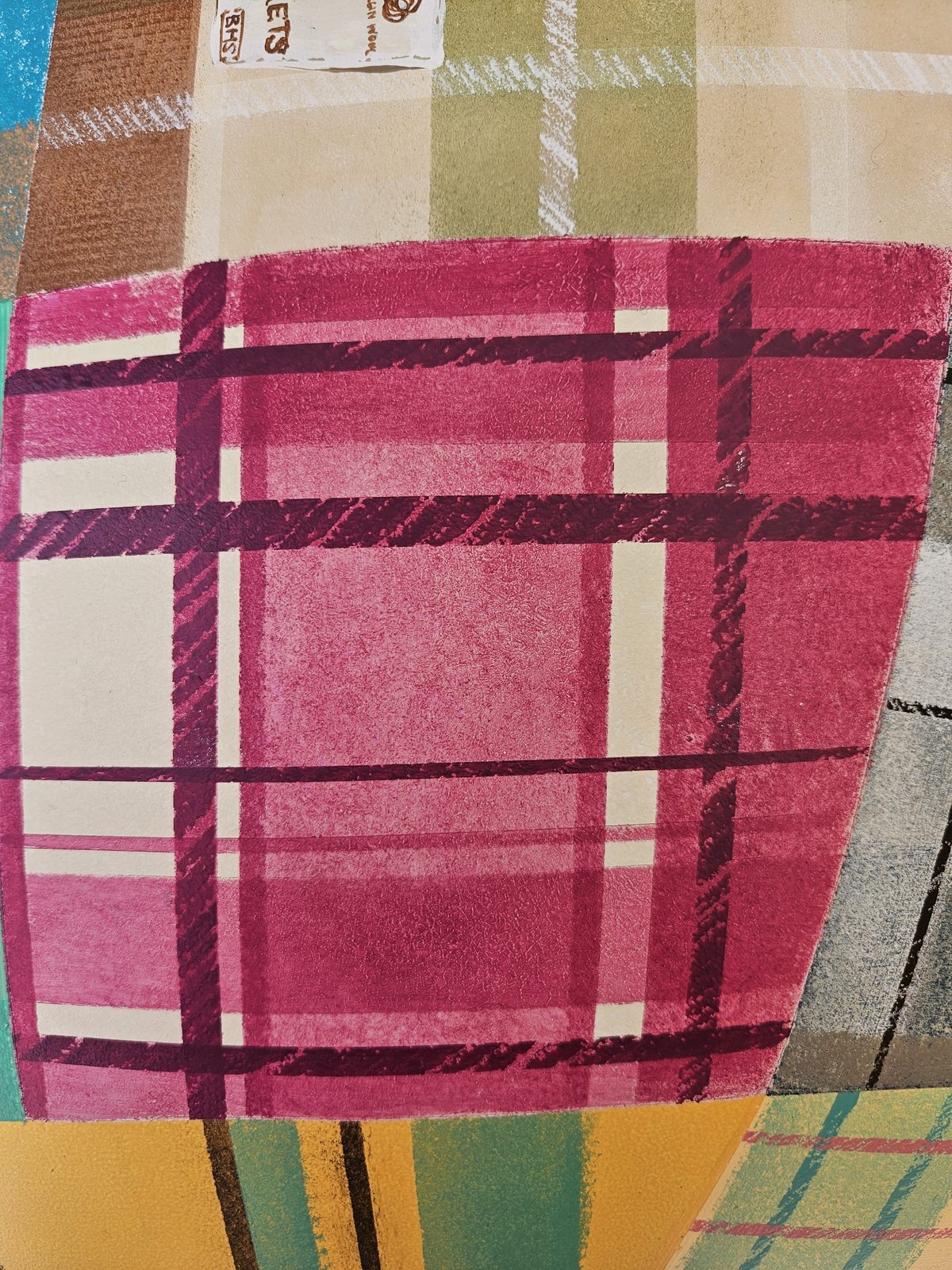 Mammoth Wolley research — close-up of a red plaid wool blanket sample
