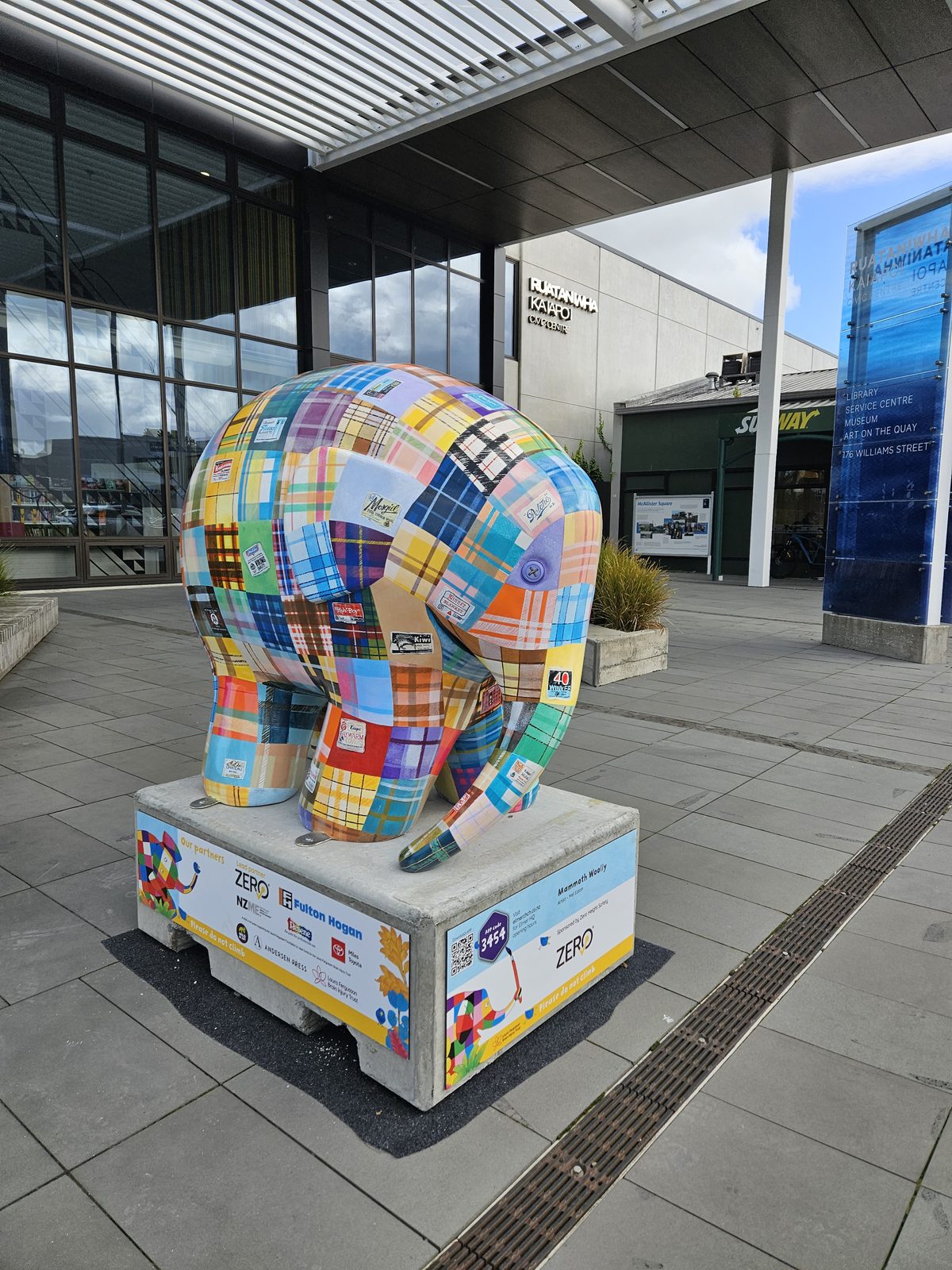 Mammoth Wolley sculpture — finished patchwork elephant on display outdoors